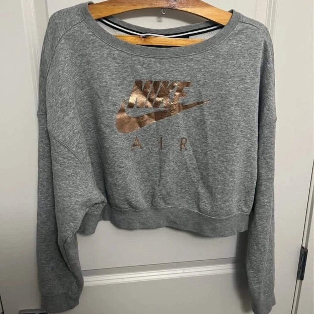 Women Nike Air Cropped Sweatshirt with gold zipper on the back in size M